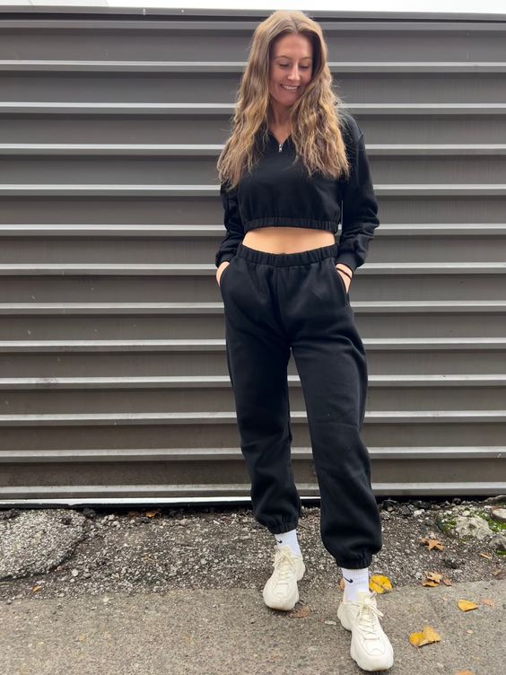 Black Cropped Hoodie with Black Sweatpants and White Sneakers